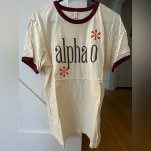 AOII beige/cream color short sleeve top.